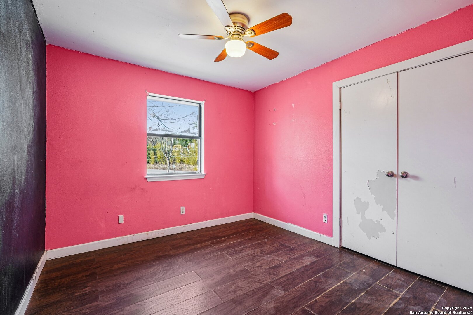 1601 Newton Street Kerrville, TX 78028 - Photo 17 of 23 a view of empty room with wooden floor and fan
