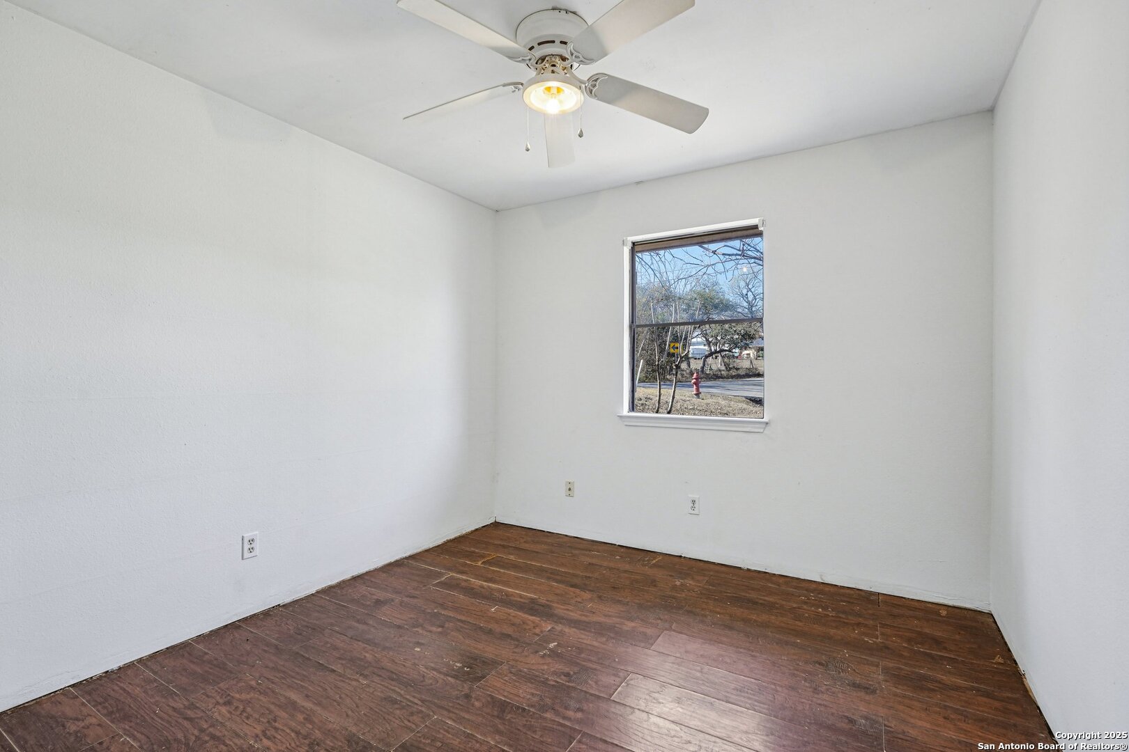 1601 Newton Street Kerrville, TX 78028 - Photo 19 of 23 a view of empty room with wooden floor