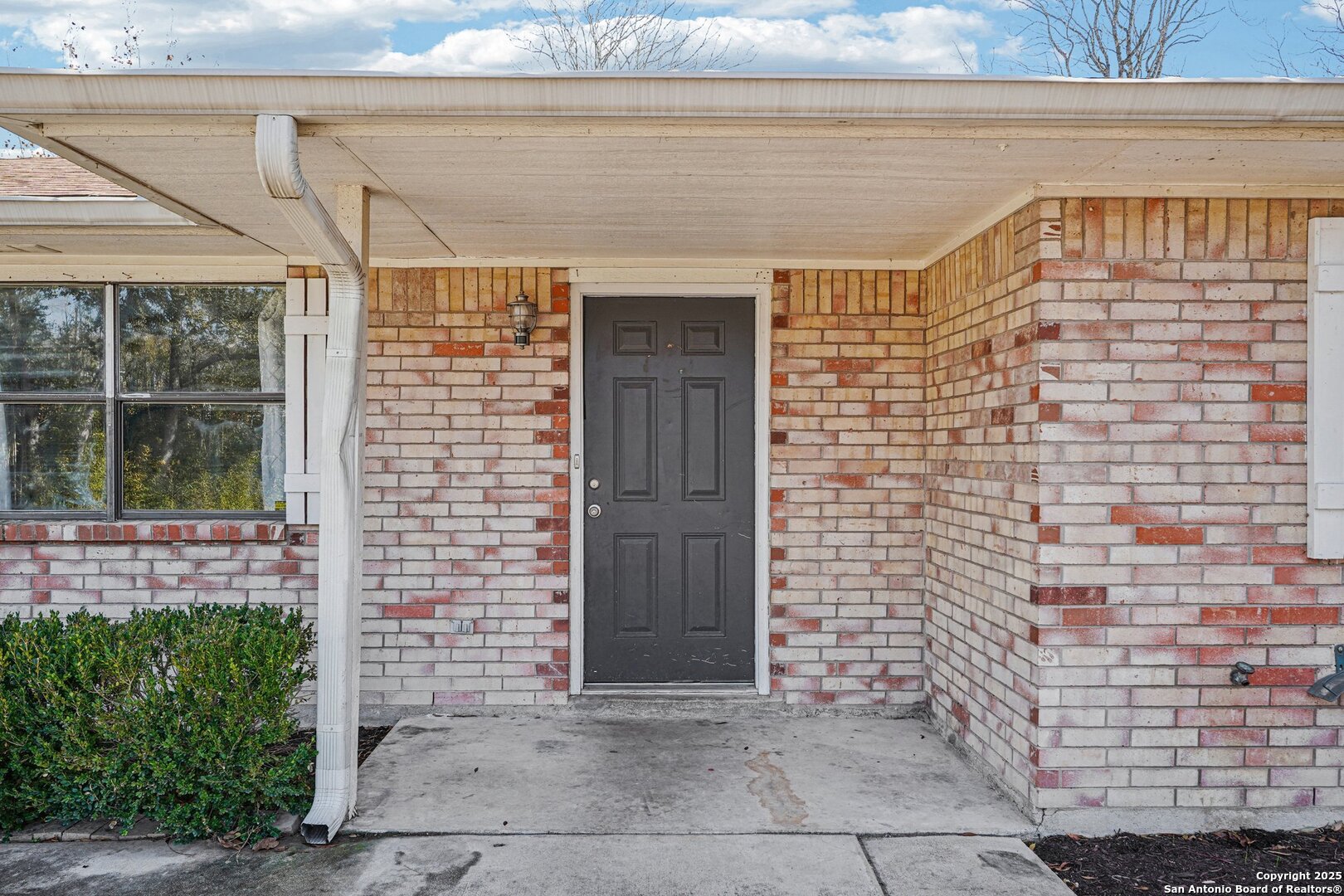 1601 Newton Street Kerrville, TX 78028 - Photo 3 of 23 a front view of a house with a shower