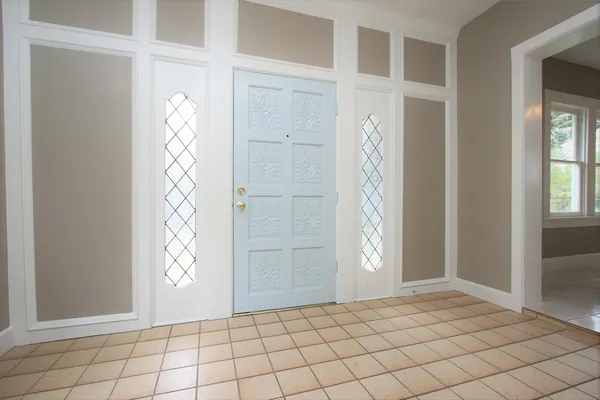 a view of an empty room and window