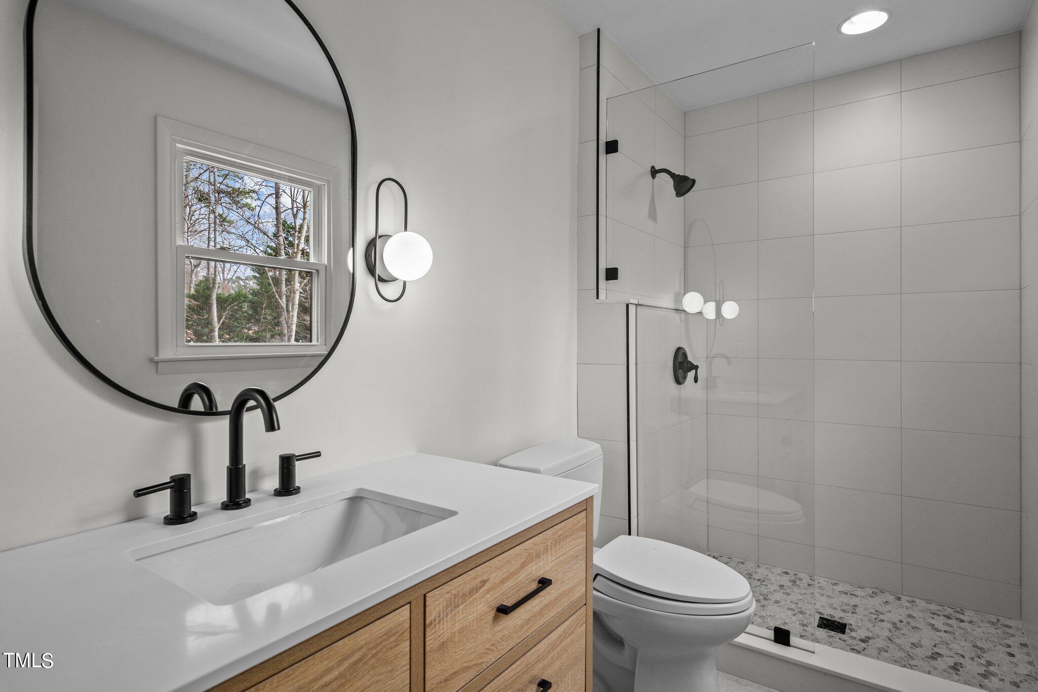 5805 Partridge Lane Raleigh, NC 27609 - Photo 21 of 27 Owners Suite Bathroom