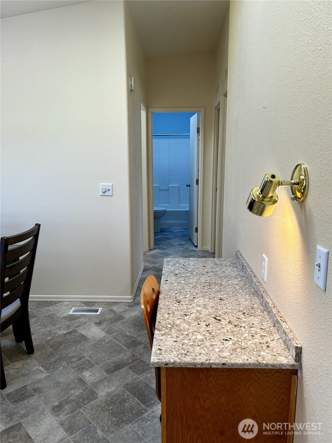 420 Cove Lane Sequim, WA 98382 - Photo 14 of 33 a bathroom with a granite countertop sink and a mirror