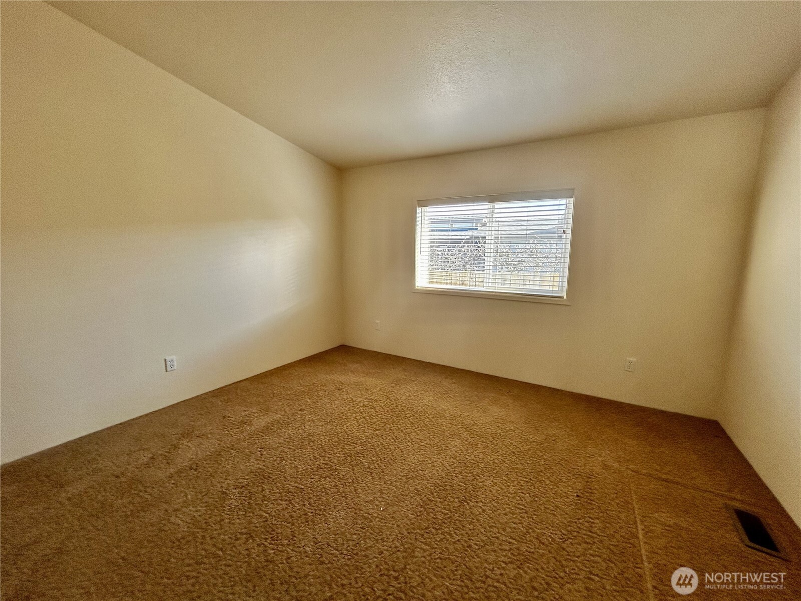 420 Cove Lane Sequim, WA 98382 - Photo 15 of 33 an empty room with a empty space and a window