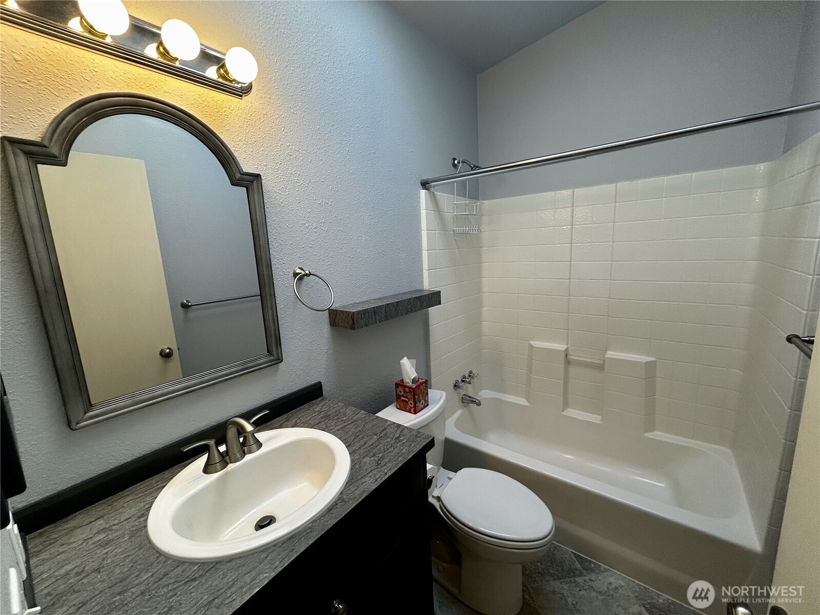 420 Cove Lane Sequim, WA 98382 - Photo 20 of 33 a bathroom with a sink toilet and a mirror
