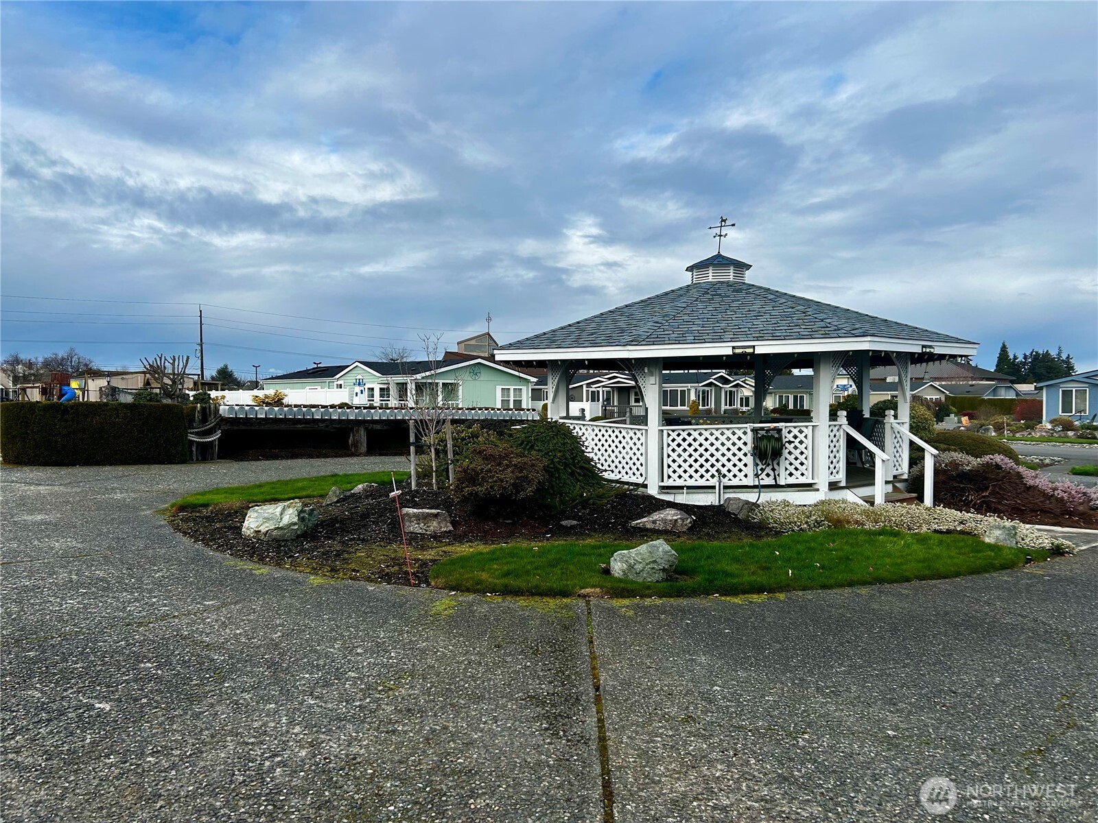 420 Cove Lane Sequim, WA 98382 - Photo 30 of 33 a front view of a house with garden