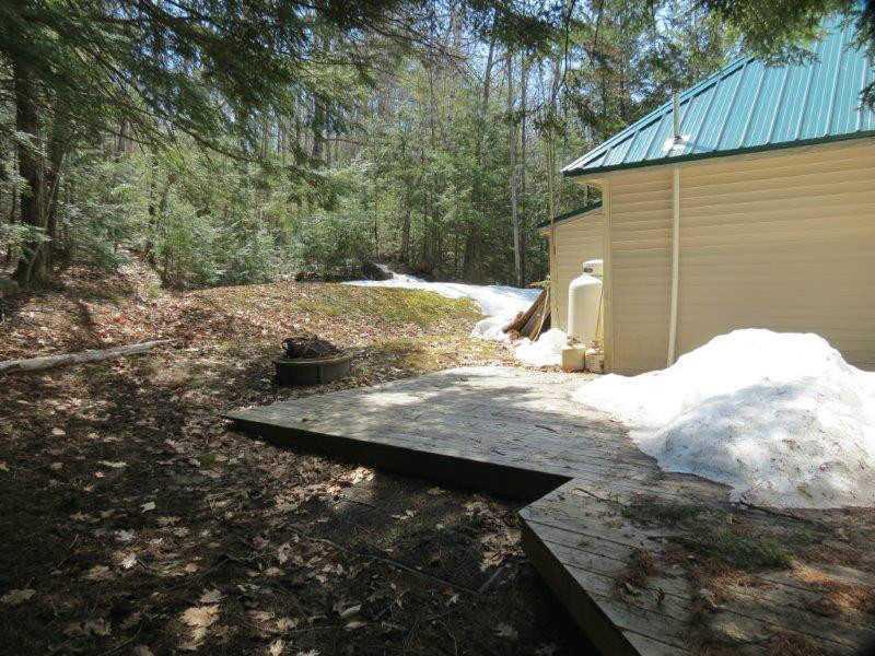 187 Norway Road Harrison, ME 04040 - Photo 20 of 30 Exterior Side View. Backyard.