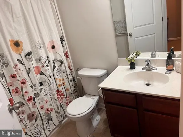 a bathroom with a sink and toilet