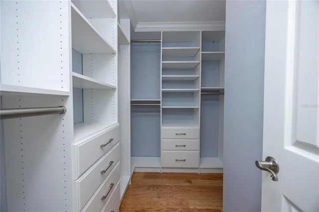 a utility room with sink dryer and washer