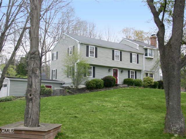 20 High Pastures Court Ridgefield, CT 06877 - Photo 1 of 1 a view of a house with a yard and a tree