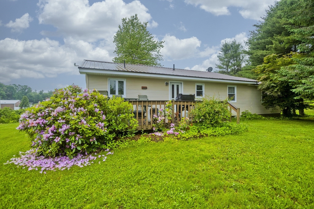 336 Russellville Road Westfield, MA 01085 - Photo 14 of 18 a front view of house with a yard and trees