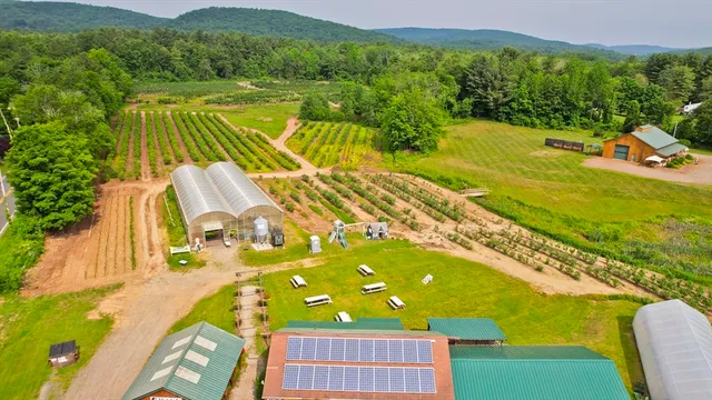 a view of a balcony with an outdoor space and seating area