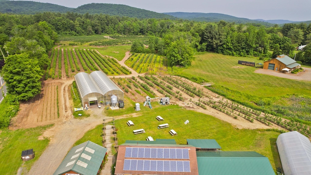 336 Russellville Road Westfield, MA 01085 - Photo 4 of 18 a view of a balcony with an outdoor space and seating area