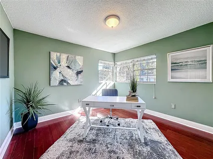 a bed room with furniture and a window