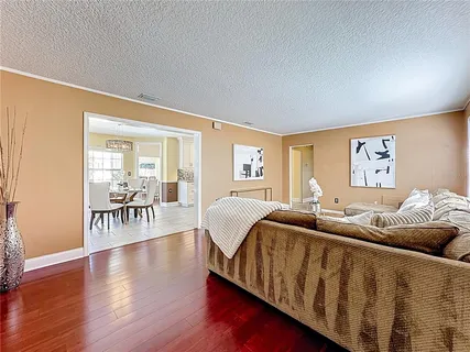 a living room with furniture and a table