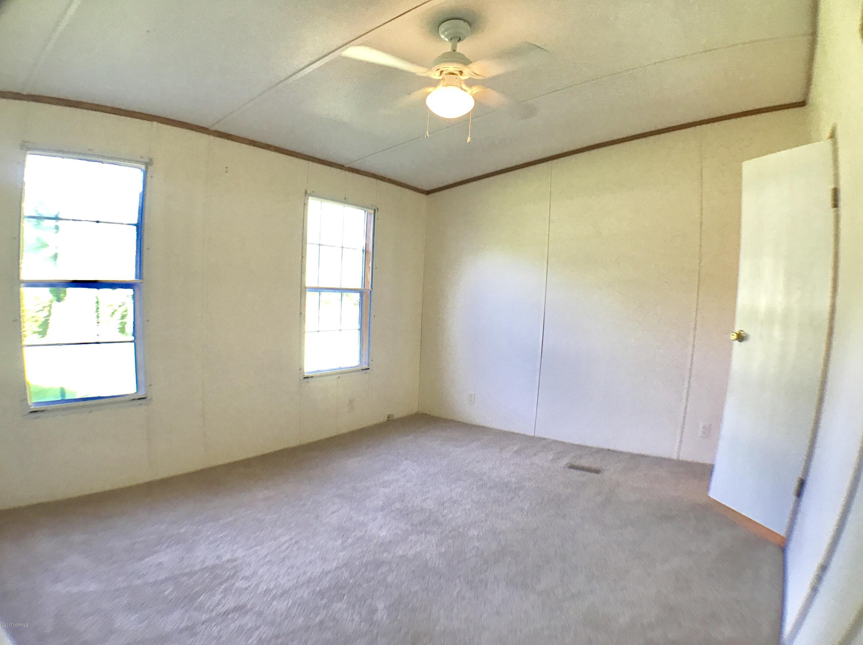 586 Harris Creek Road Jacksonville, NC 28540 - Photo 9 of 19 Master Bedroom