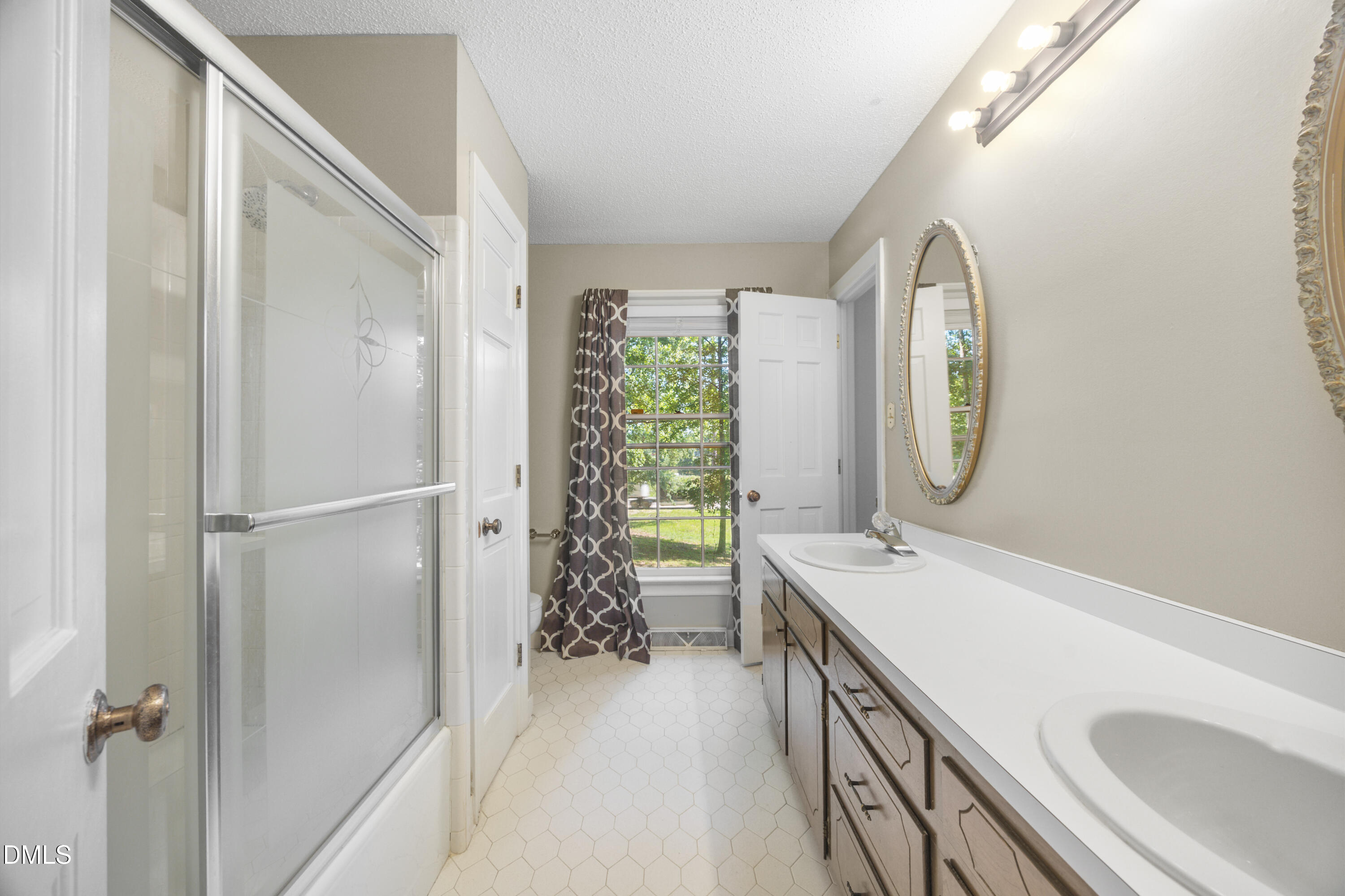5012 Rock Quarry Road Raleigh, NC 27610 - Photo 30 of 63 Ensuite Bath 2 w/ Hall Access