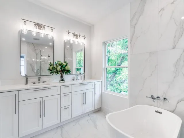 a bathroom with a sink and a bathtub