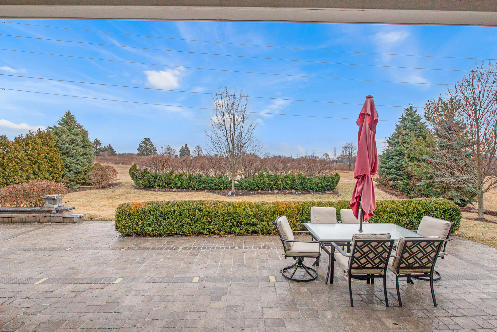 12801 Dunmoor Drive Lemont, IL 60439 - Photo 3 of 4 a view of a patio with a table chairs and a table