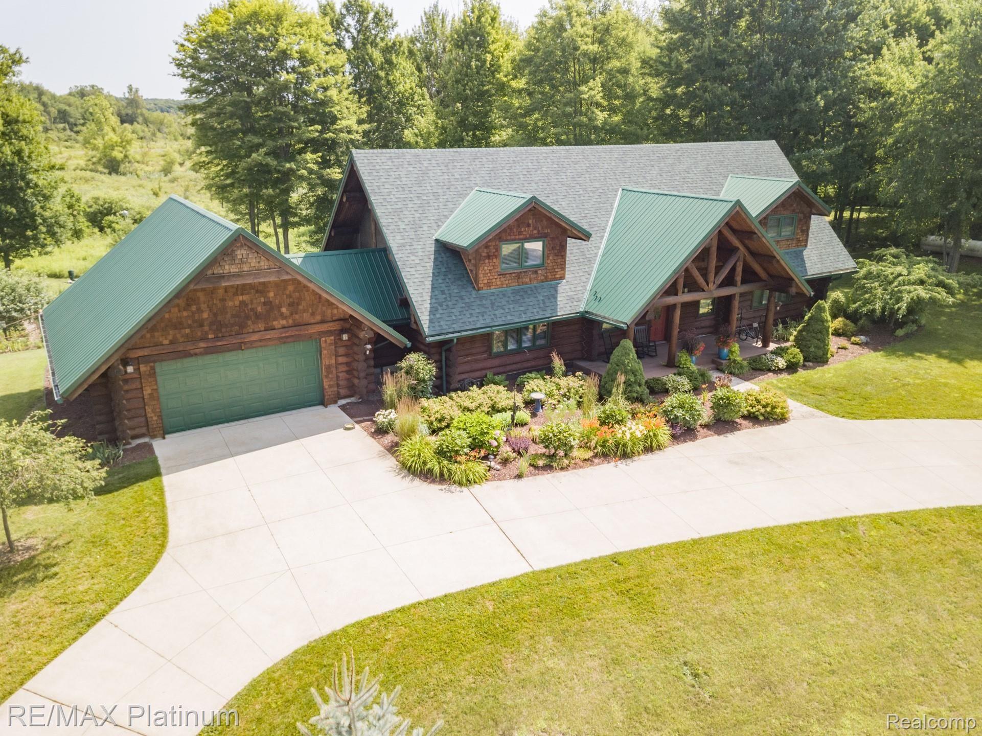 8335 Cedar Lake Road Pinckney, MI 48169 - Photo 1 of 55 Primary Photo