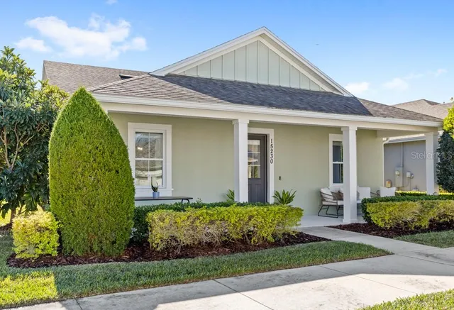 a picture of a bench in front of a wall