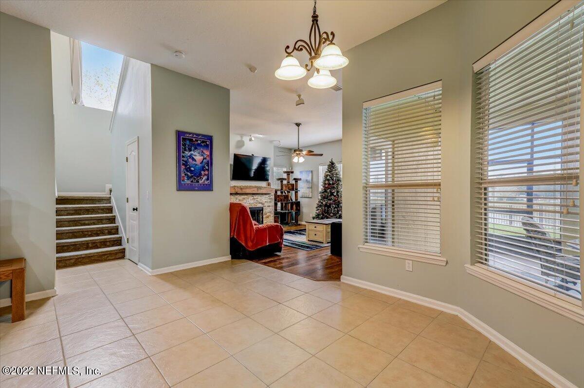 697 Porta Rosa Circle St. Augustine, FL 32092 - Photo 11 of 43 a view of a livingroom with furniture and a window