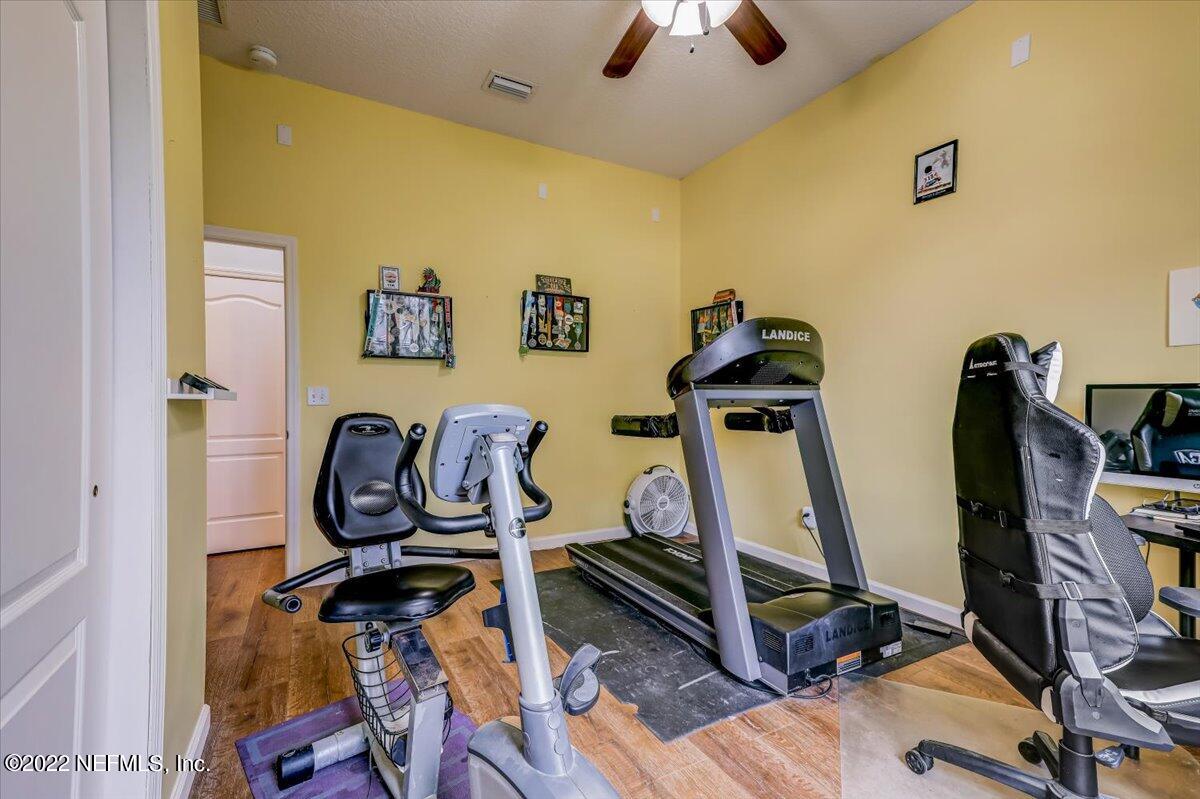 697 Porta Rosa Circle St. Augustine, FL 32092 - Photo 17 of 43 a view of a room with gym equipment