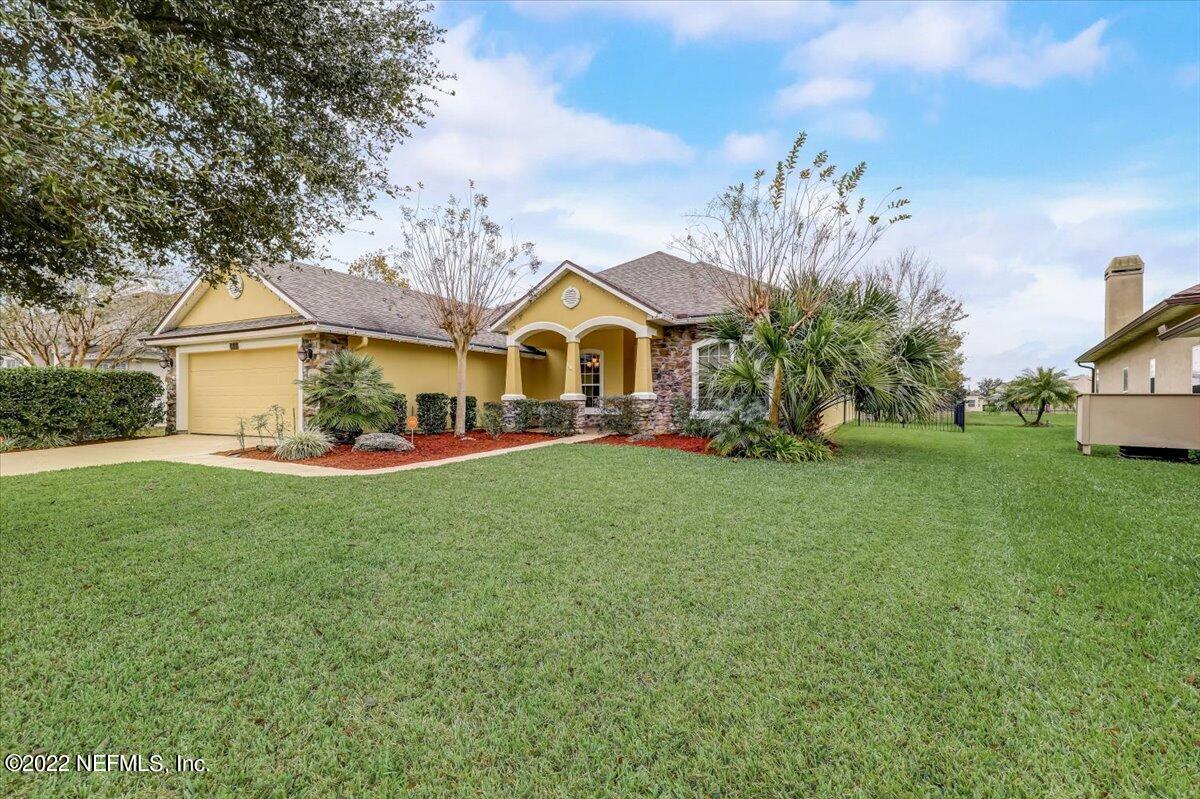 697 Porta Rosa Circle St. Augustine, FL 32092 - Photo 2 of 43 a view of house with garden