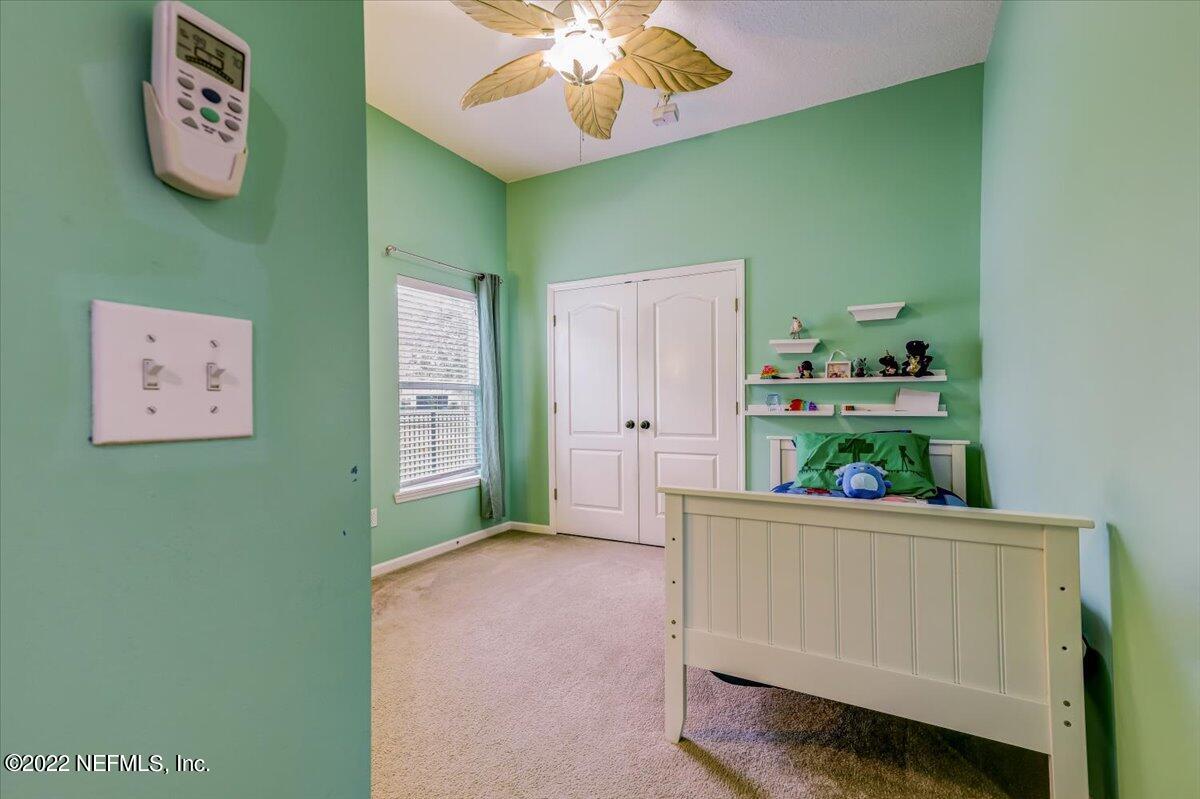 697 Porta Rosa Circle St. Augustine, FL 32092 - Photo 28 of 43 a room with painting and a table