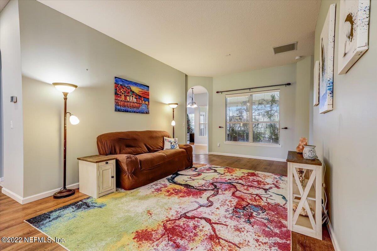697 Porta Rosa Circle St. Augustine, FL 32092 - Photo 6 of 43 a bedroom with furniture and a window