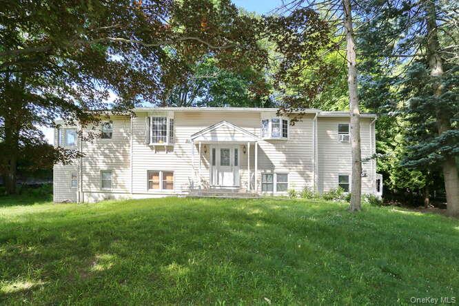 1 Charlotte Drive Spring Valley, NY 10977 - Photo 3 of 25 Rear view of property with a yard