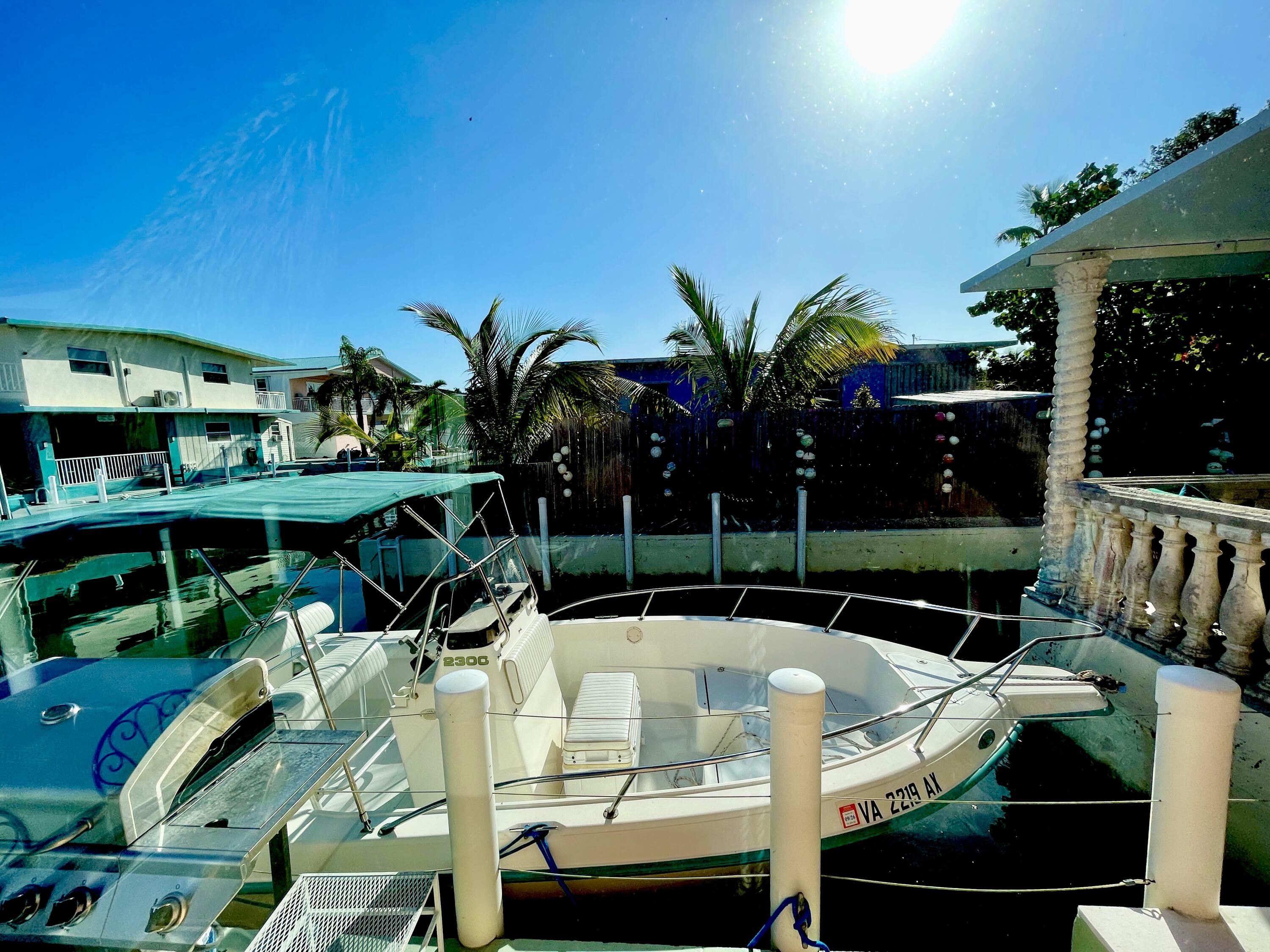64 Seagate Boulevard Key Largo, FL 33037 - Photo 43 of 44 concrete dock-davits