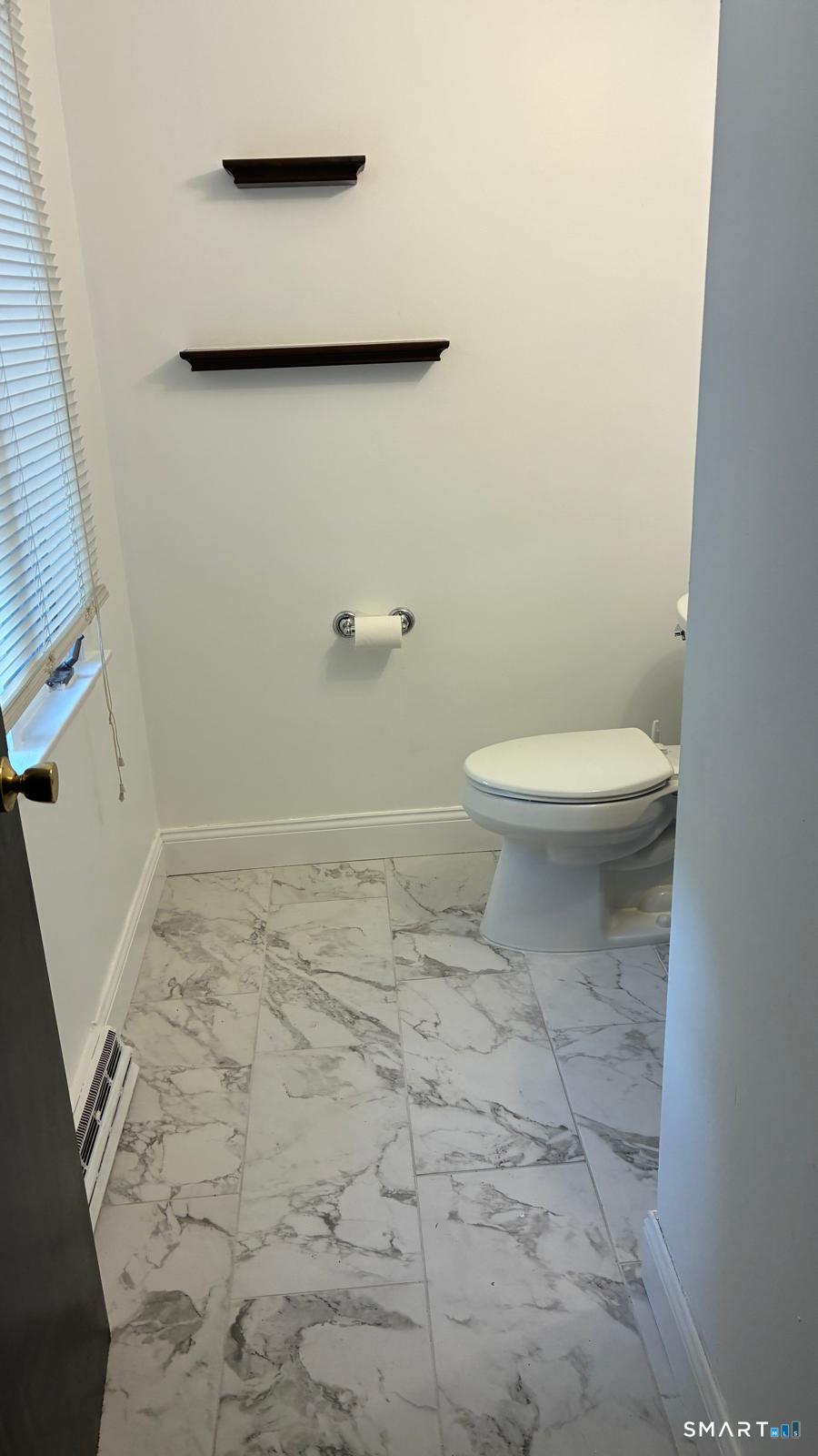 715 Frenchtown Road, Unit 4 Bridgeport, CT 06606 - Photo 6 of 6 a bathroom with a toilet