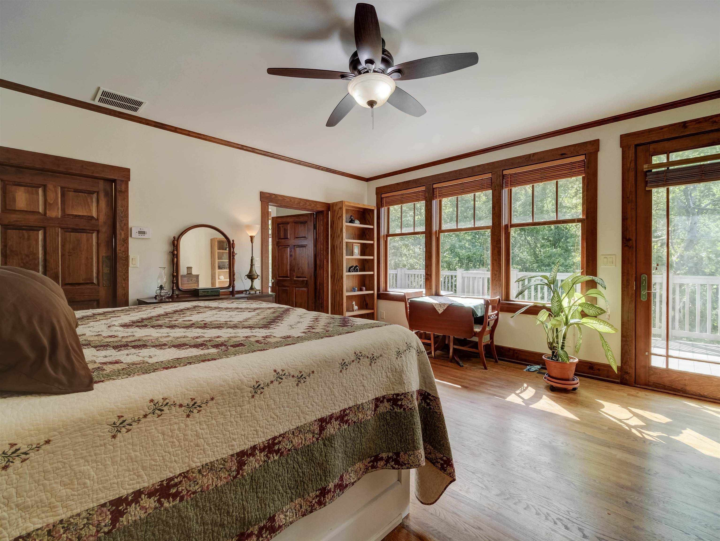 7304 Dry Run Road Williamsville, VA 24487 - Photo 27 of 57 a bedroom with a large bed and a large window