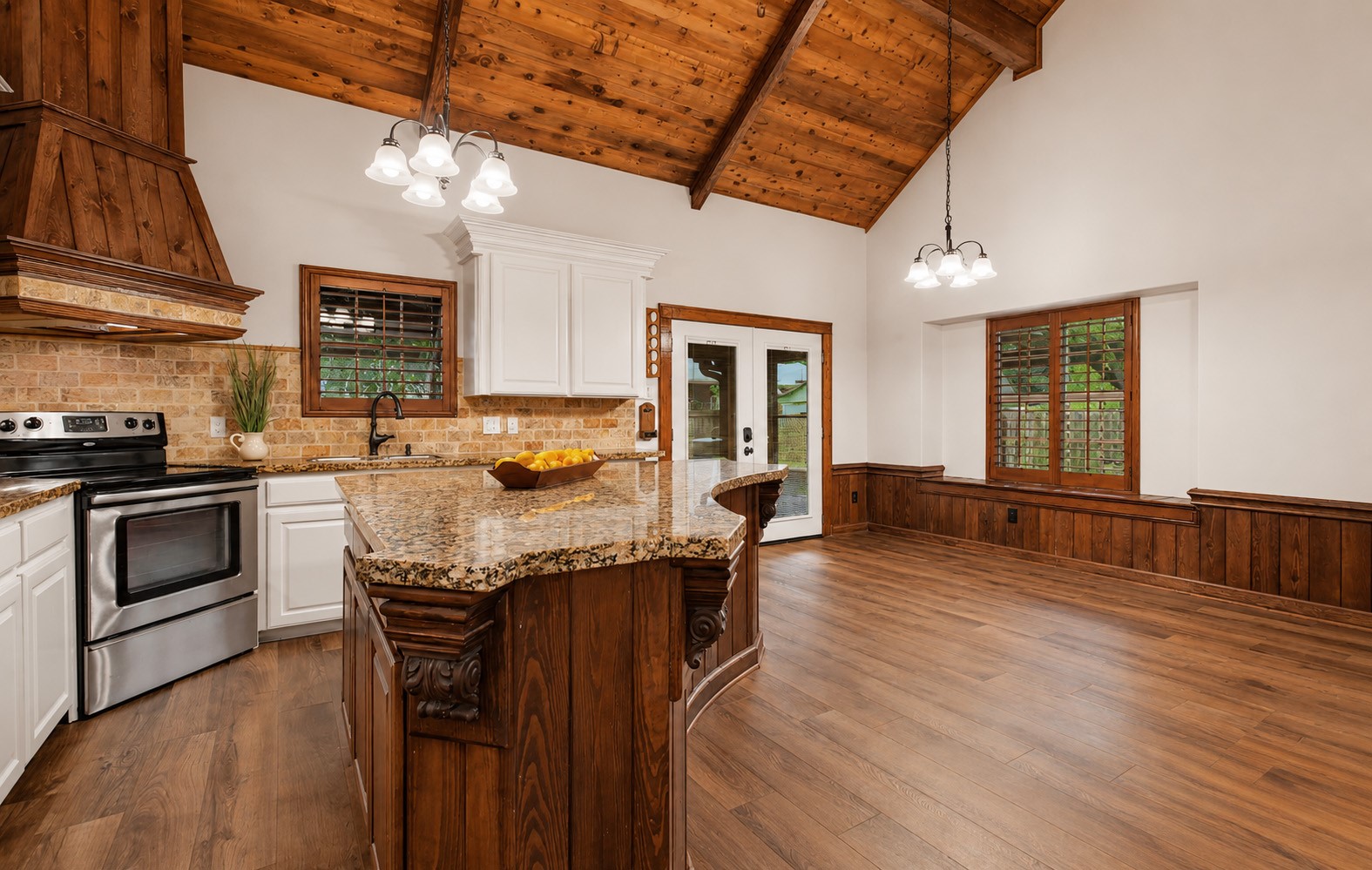 312 Springwood Drive Conroe, TX 77385 - Photo 20 of 50 Bright dining area with views of the backyard and open access to the kitchen.