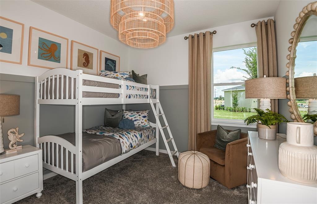 3768 Obsidian Drive Spring Hill, FL 34609 - Photo 15 of 24 a bedroom with furniture and a window