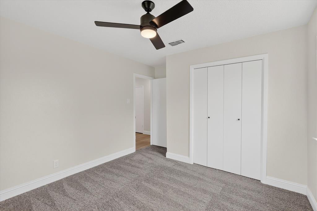 6425 Summit Ridge Drive Watauga, TX 76148 - Photo 14 of 18 Secondary bedroom.