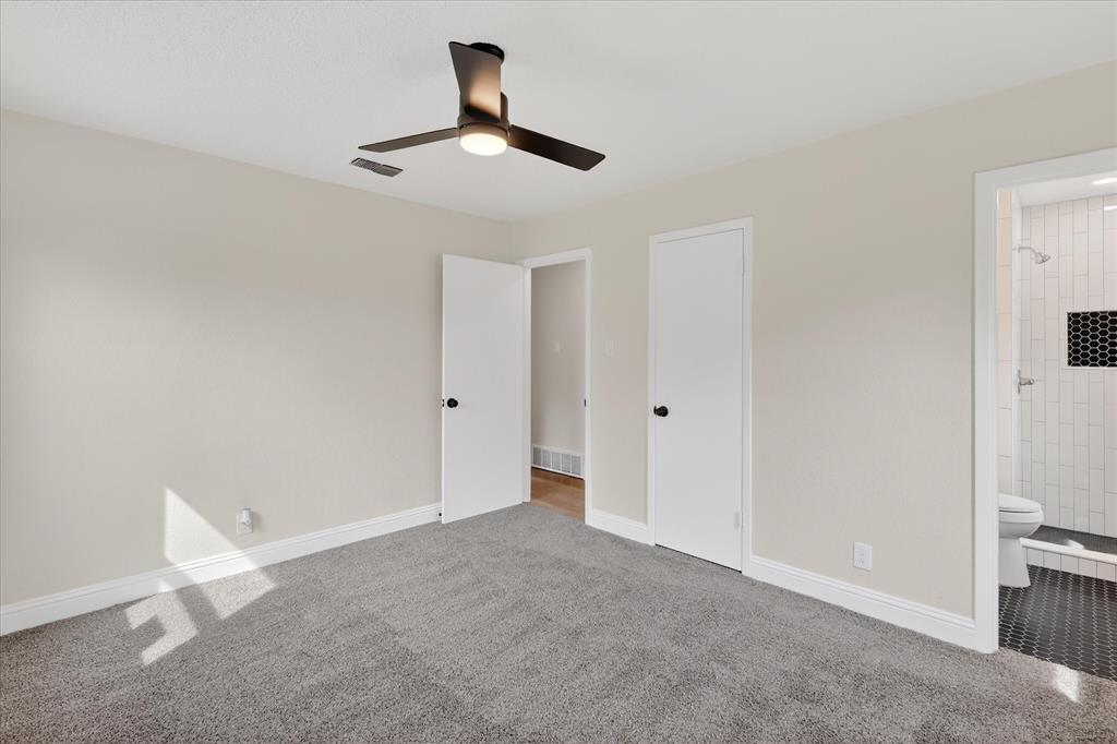 6425 Summit Ridge Drive Watauga, TX 76148 - Photo 6 of 18 Primary bedroom. Ensuite bathroom