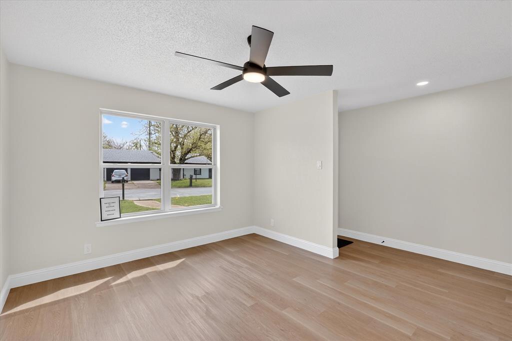 6425 Summit Ridge Drive Watauga, TX 76148 - Photo 7 of 18 Dining Room.New windows, flooring and fan