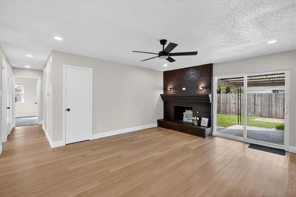 6425 Summit Ridge Drive Watauga, TX 76148 - Photo 9 of 18 New sliding doors that lead to the backyard patio