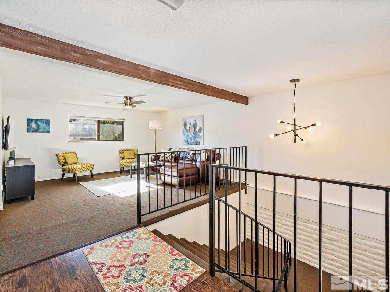 3447 Skyline Boulevard Reno, NV 89509 - Photo 11 of 24 a view of a livingroom with furniture and window