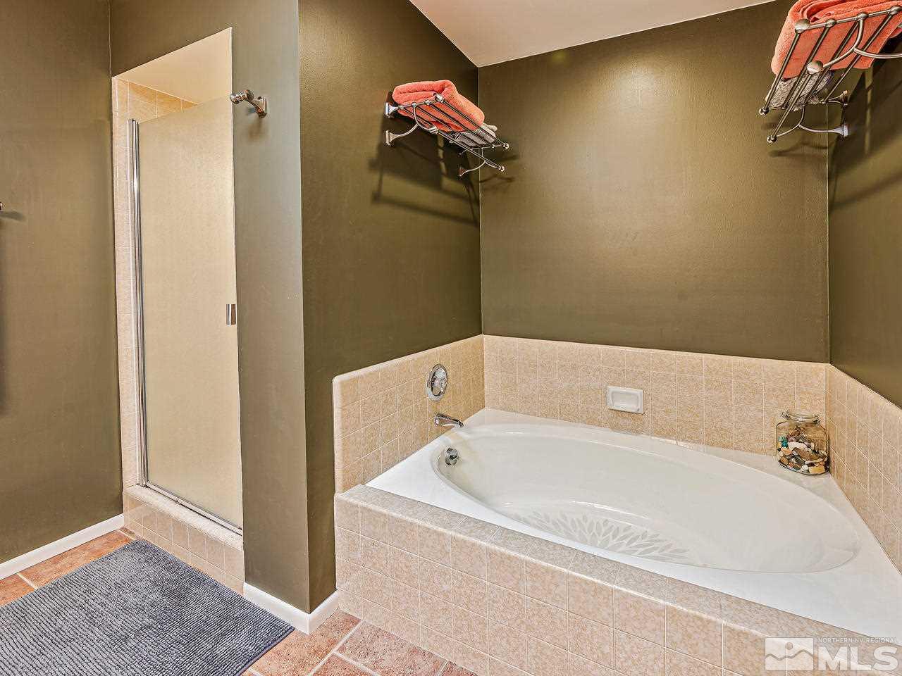 3447 Skyline Boulevard Reno, NV 89509 - Photo 17 of 24 a bathroom with a bathtub