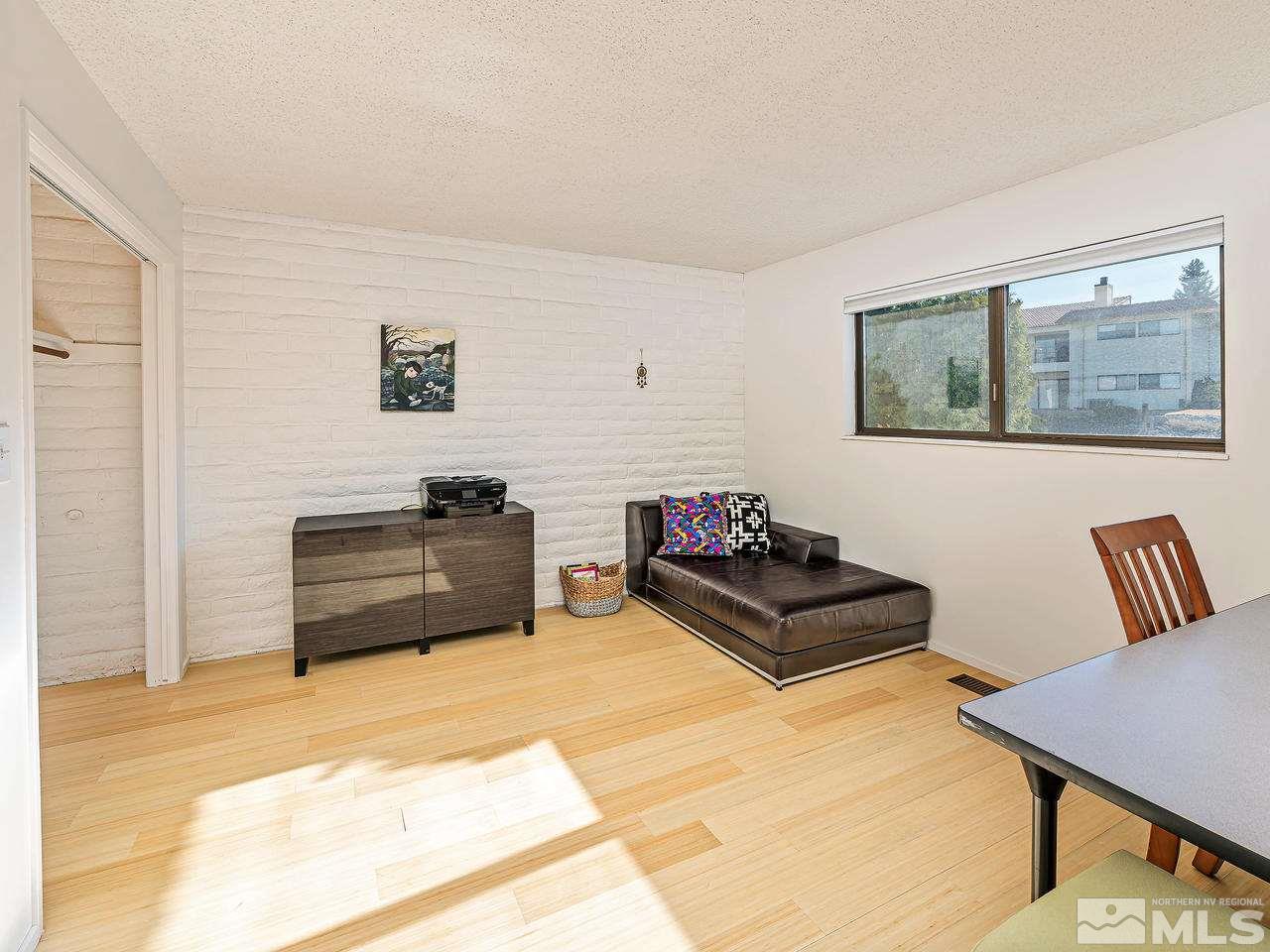 3447 Skyline Boulevard Reno, NV 89509 - Photo 18 of 24 a living room with furniture and a couch