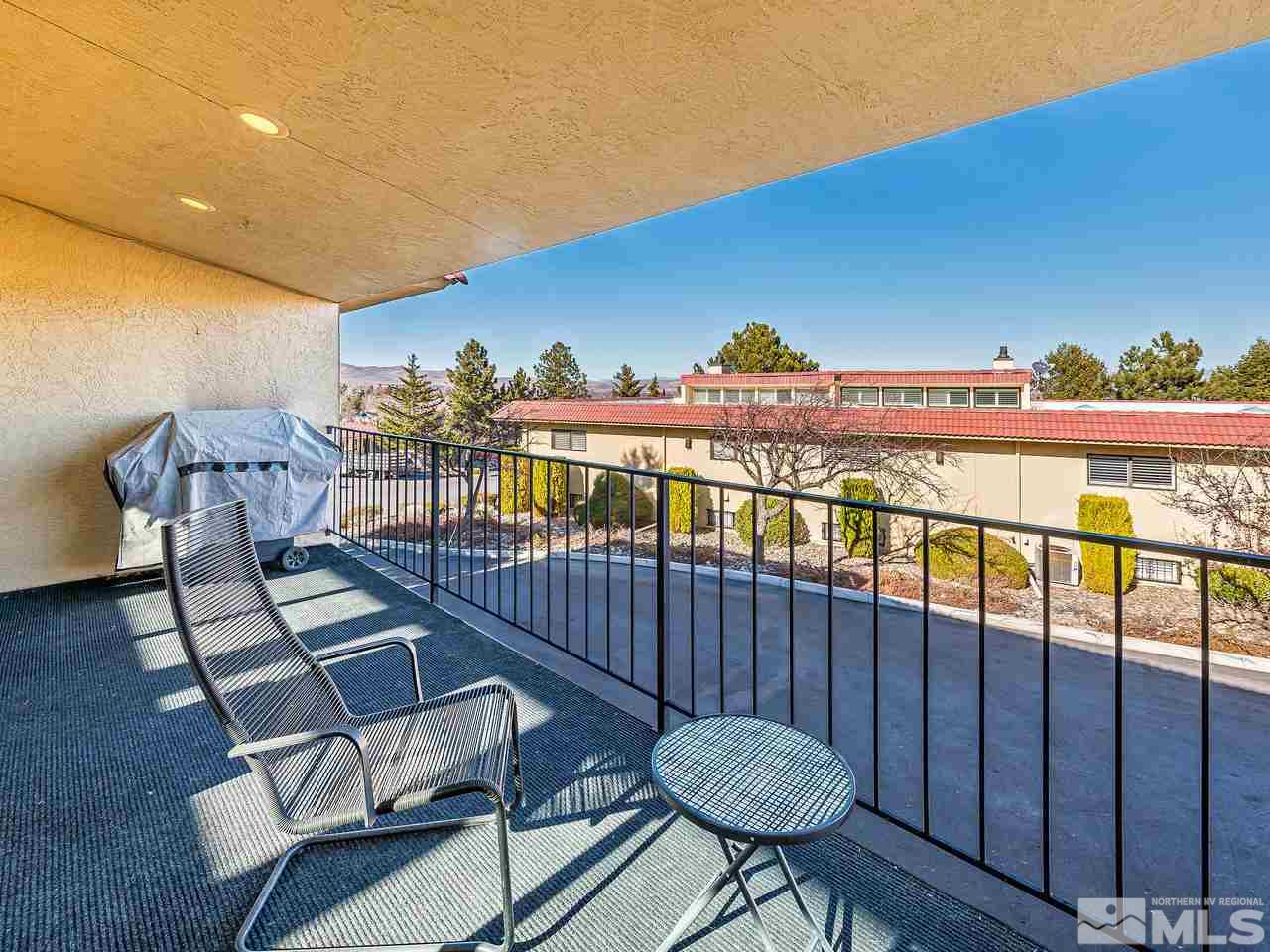 3447 Skyline Boulevard Reno, NV 89509 - Photo 22 of 24 a view of a chairs and table in the patio