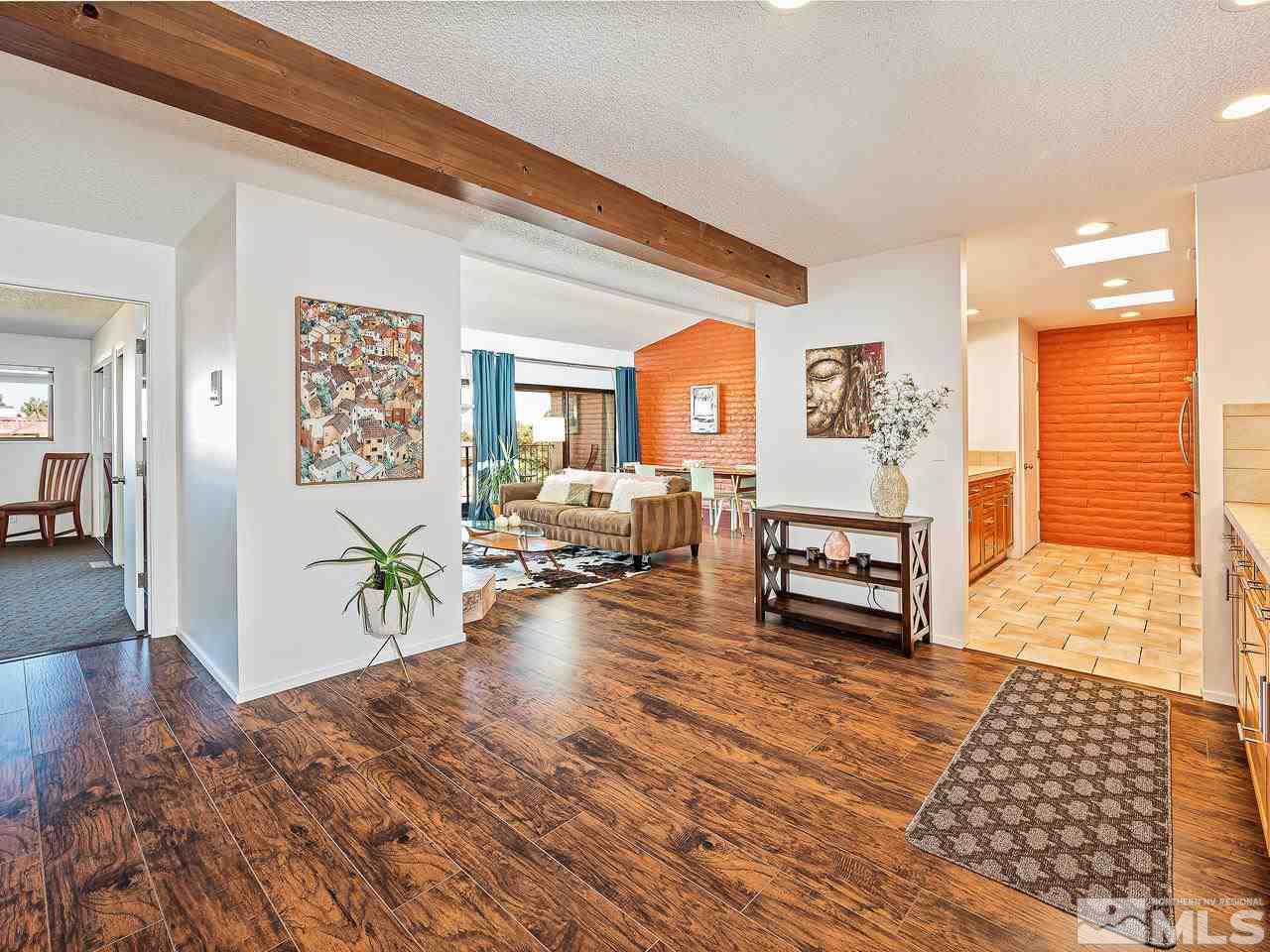3447 Skyline Boulevard Reno, NV 89509 - Photo 7 of 24 a living room with furniture and wooden floor