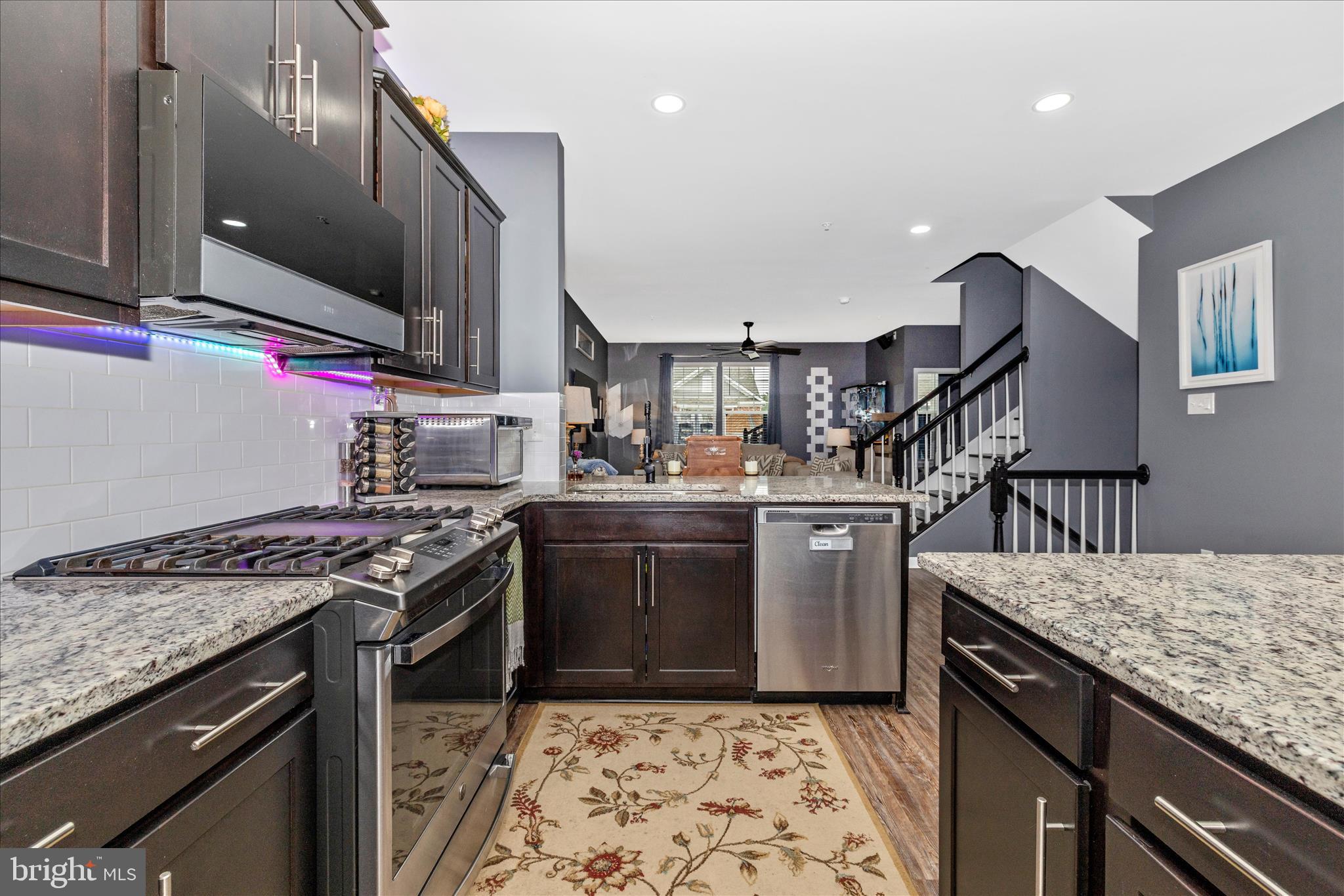 7001 Freedom Way Frederick, MD 21703 - Photo 15 of 65 a kitchen with granite countertop a sink stove and refrigerator