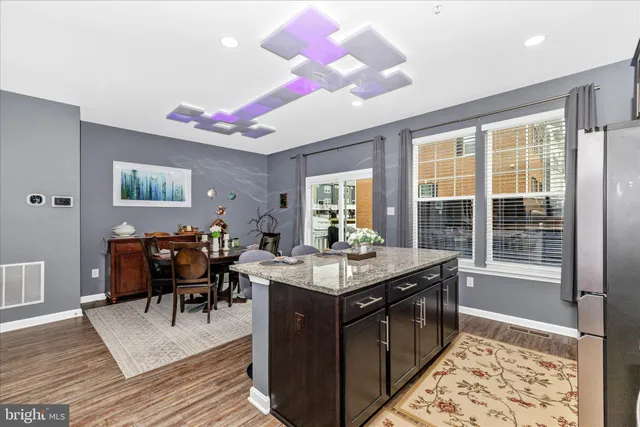 a view of a chairs and tables in the balcony