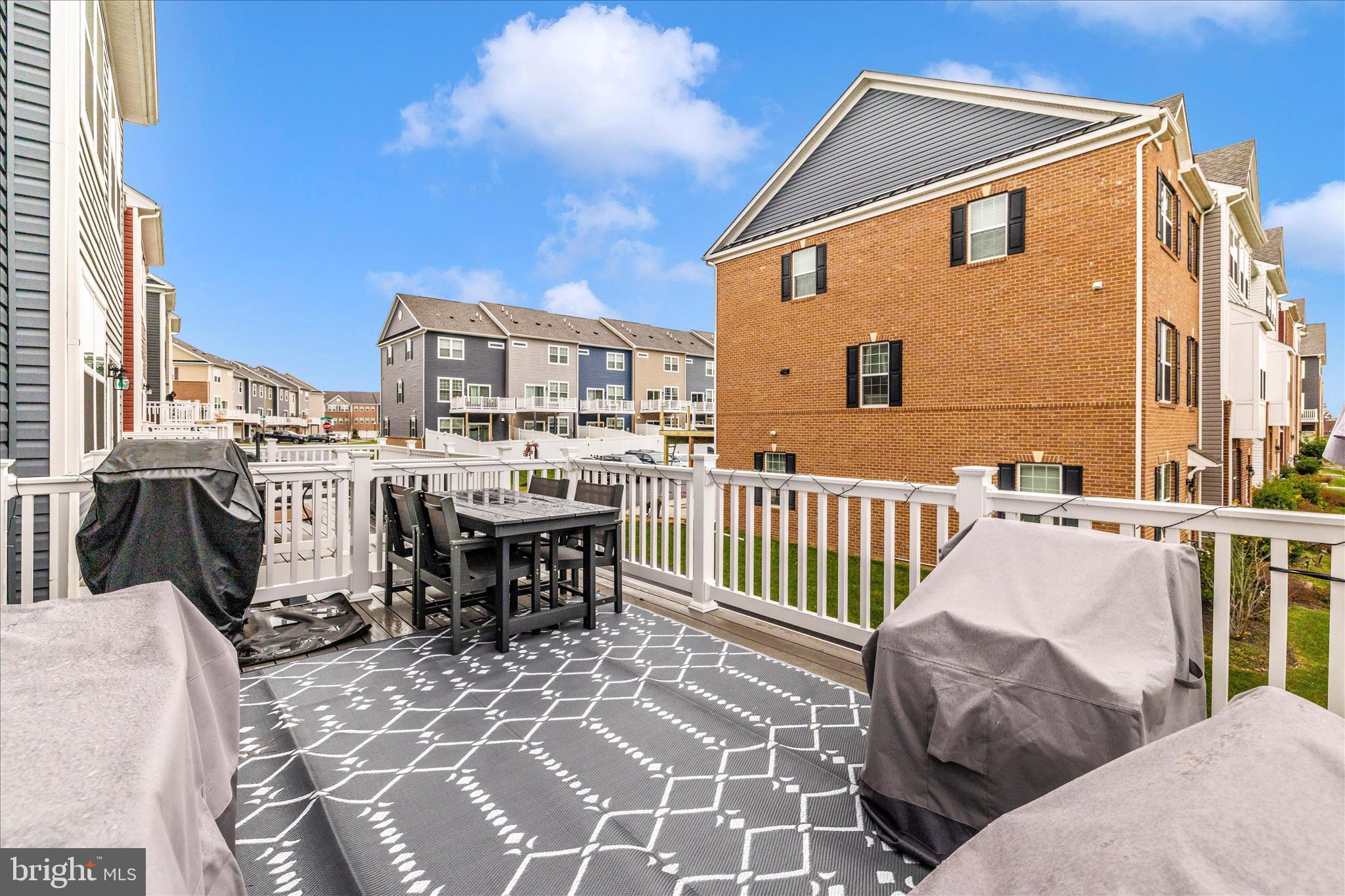 7001 Freedom Way Frederick, MD 21703 - Photo 18 of 65 a view of a chairs and tables in the balcony