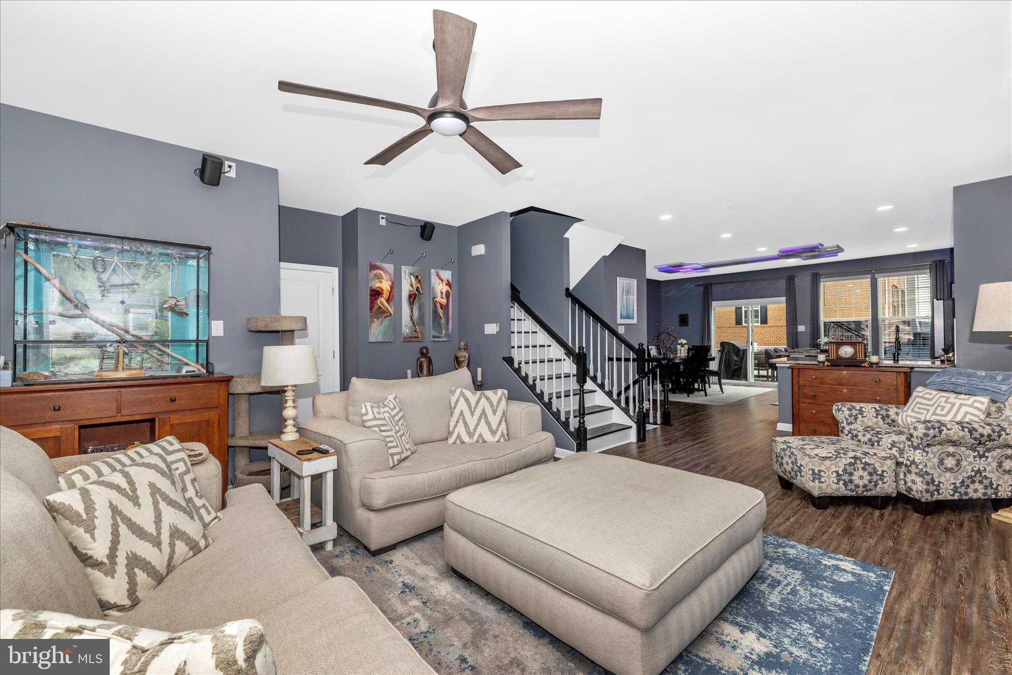 7001 Freedom Way Frederick, MD 21703 - Photo 23 of 65 a living room with furniture and a wooden floor