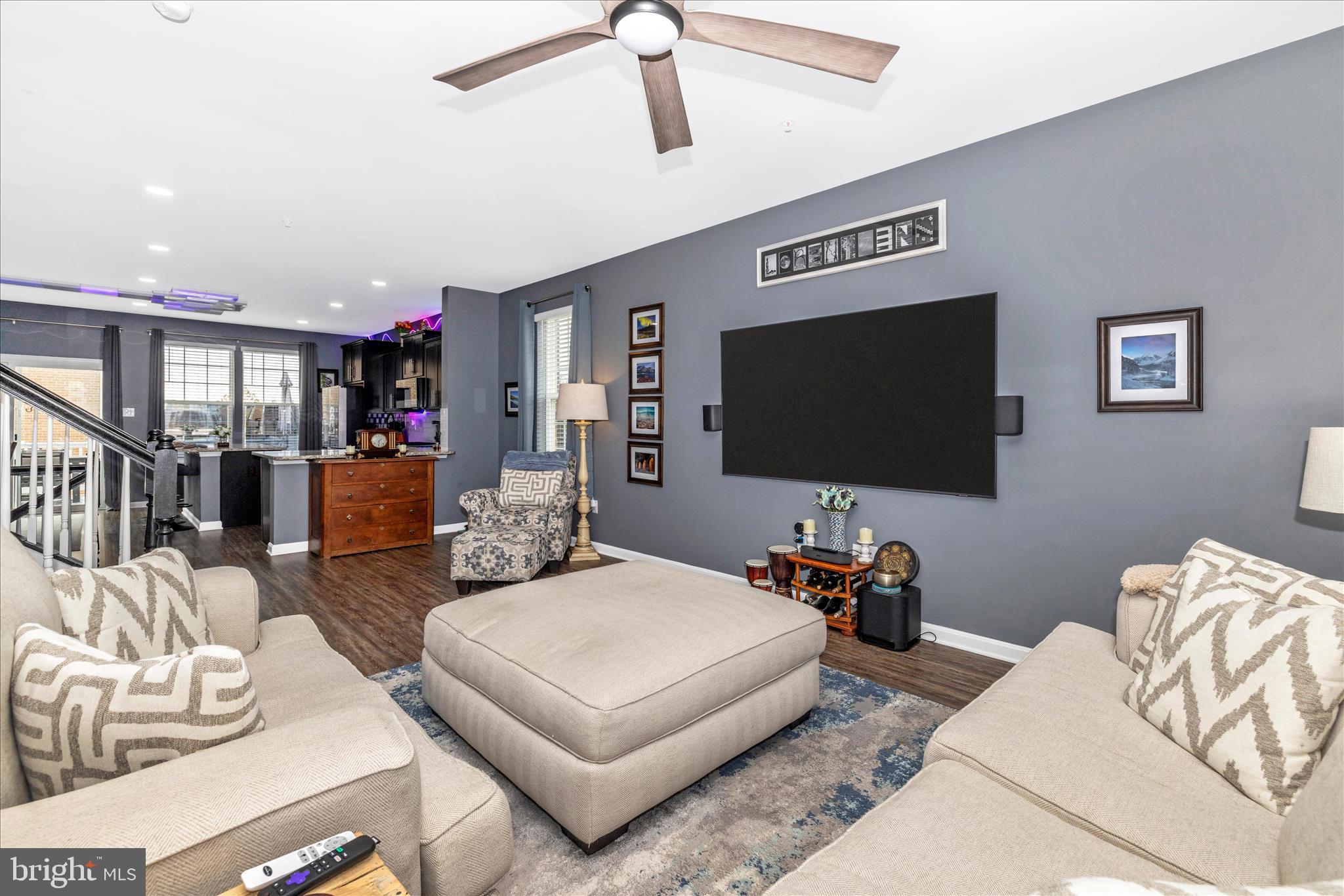 7001 Freedom Way Frederick, MD 21703 - Photo 24 of 65 a living room with furniture and a flat screen tv