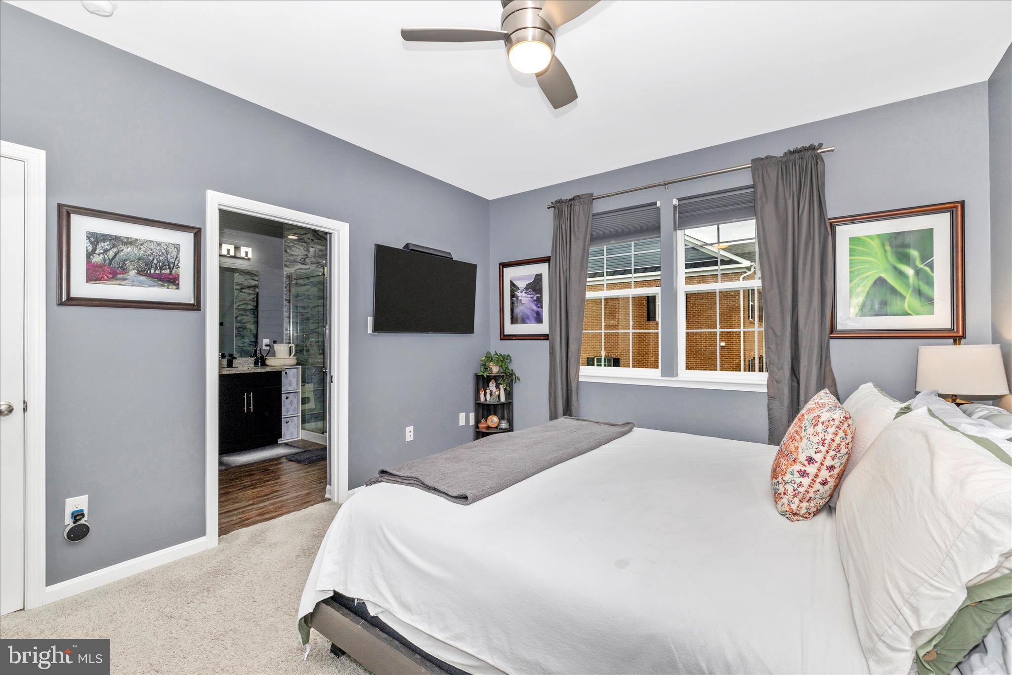 7001 Freedom Way Frederick, MD 21703 - Photo 27 of 65 a bedroom with a bed and a large window